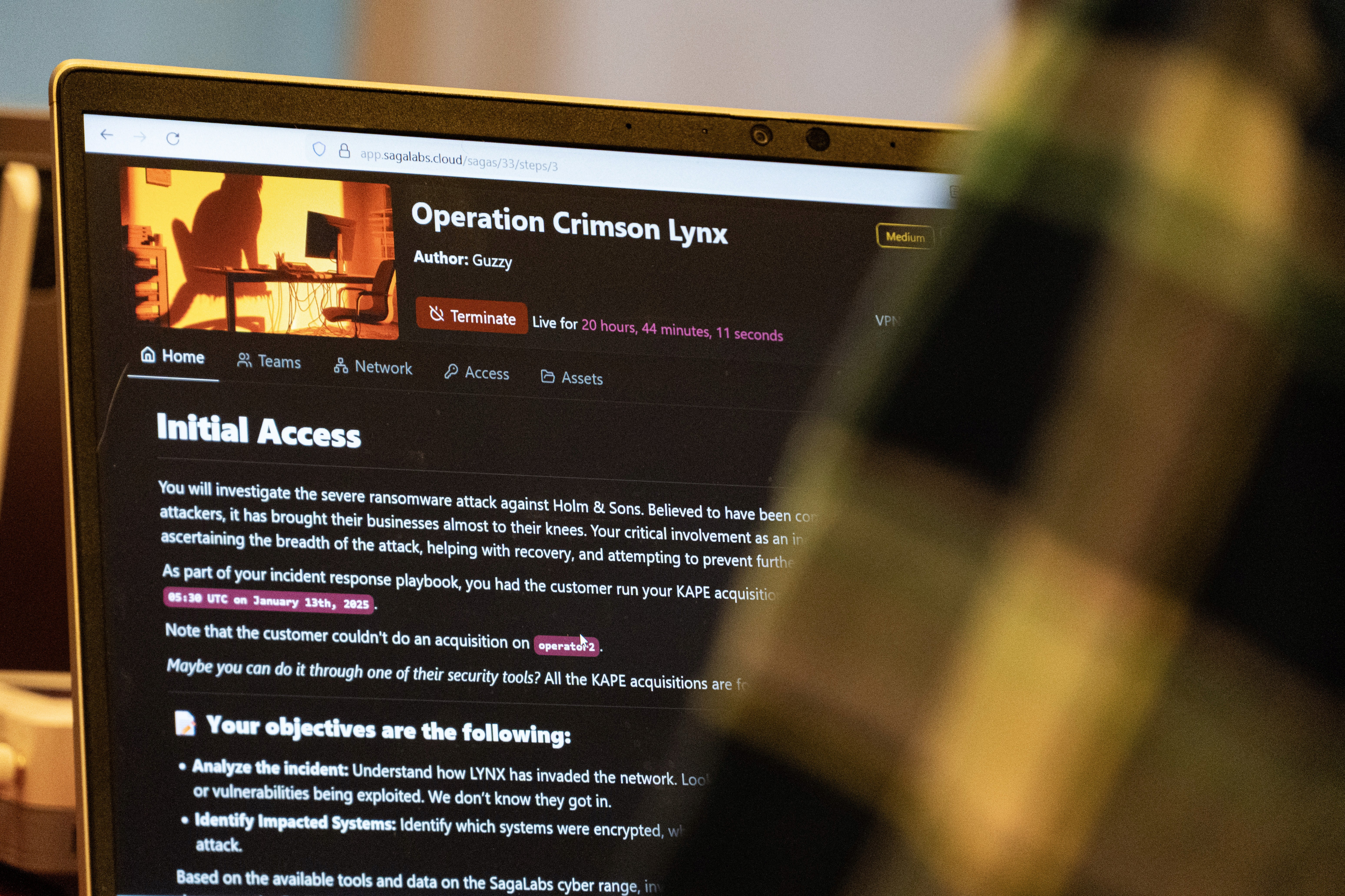 Person sitting and reading how to get the initial access to the scenario Operation Crimson Lynx